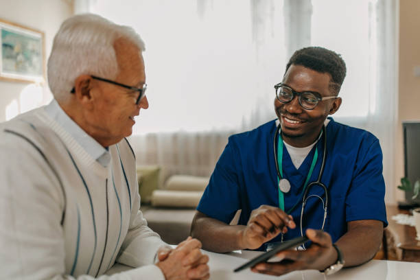istock Doctor explaining tele medicine to a patient 1289421908