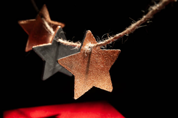 istock Gift red box with retro craft gift star. Christmas present. Magic concept. Copy space 1289428258