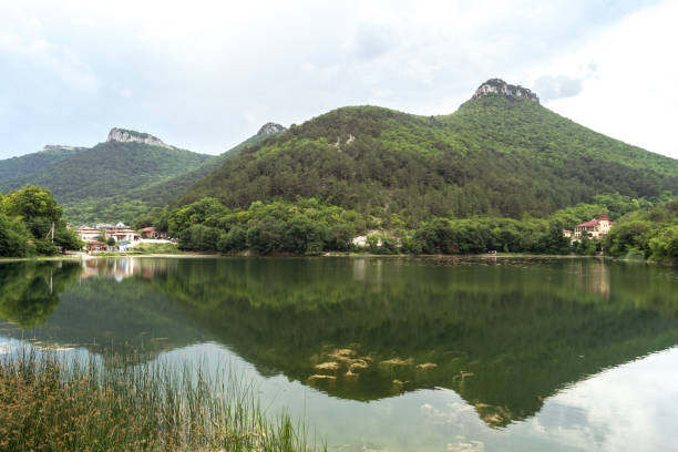 istock Houses stand on the lake 1289428464