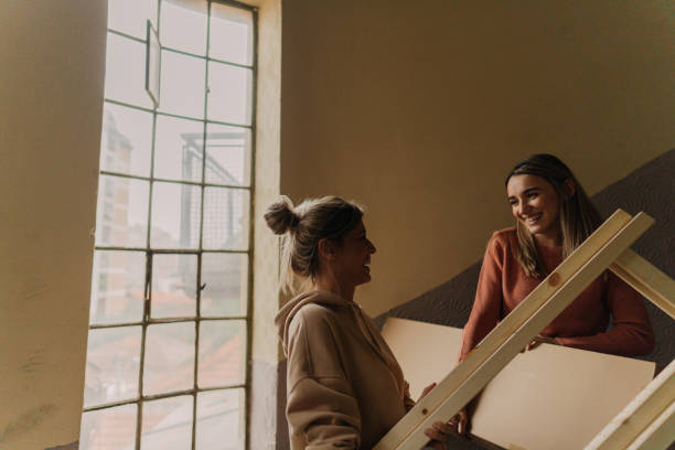 istock Roommates moving into a new apartment 1289429530