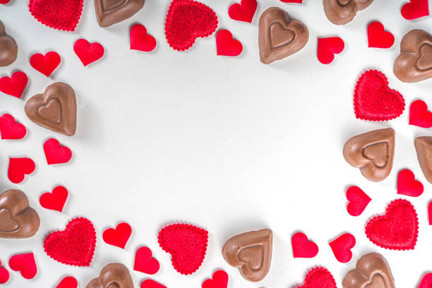 istock Red and chocolate hearts background 1289429904