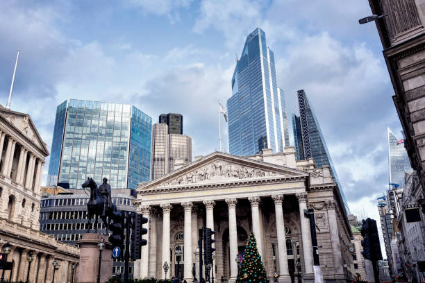 View of the Royal Exchange with Christmas tree in the City of London The Royal Exchange and the corporate office buildings of the City of London bank of england stock pictures, royalty-free photos & images