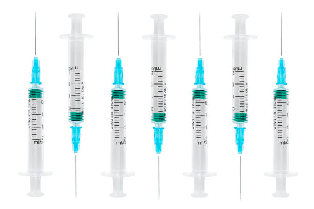 istock Set empty syringe close up isolated on white background. Vaccine plastic hypodermic syringe. Close-up of medical syringe. Syringe for injection and vaccination solution. 1289432872