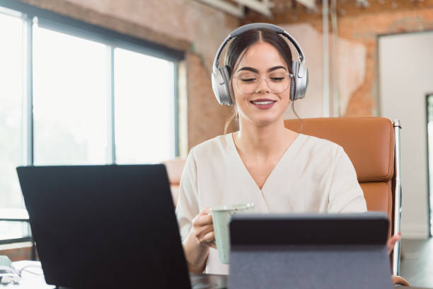istock Busy businesswoman working in her office 1289433512