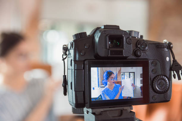 istock Teacher records lesson for virtual students during COVID-19 1289433592