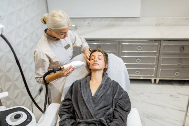 istock Woman during a laser rejuvenation treatment 1289434530