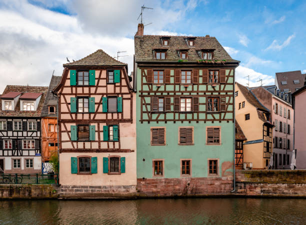 Half-timbered houses facing river Ill, in Petite France district, Strasbourg, France.