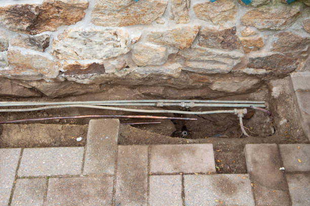 istock Water and gas pipes in a trench 1289439096
