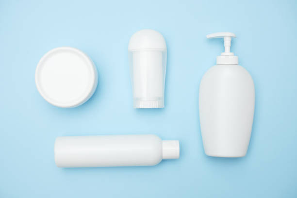 istock personal hygiene product white jars on a blue background, copy space, top view 1289440508