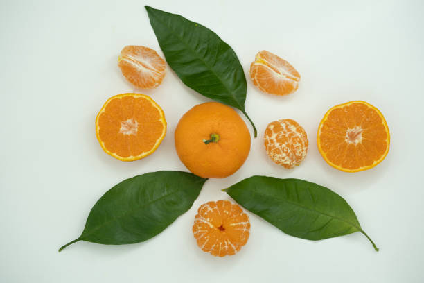 istock Tangerine or mandarin isolated on white background. Top view. Flat lay 1289440711