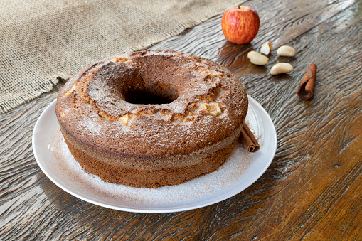 apple cake, with brazil nuts, cinnamon and sugar