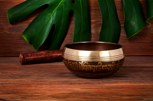 Tibetan singing bowl. Tibetian inscription - mantra \