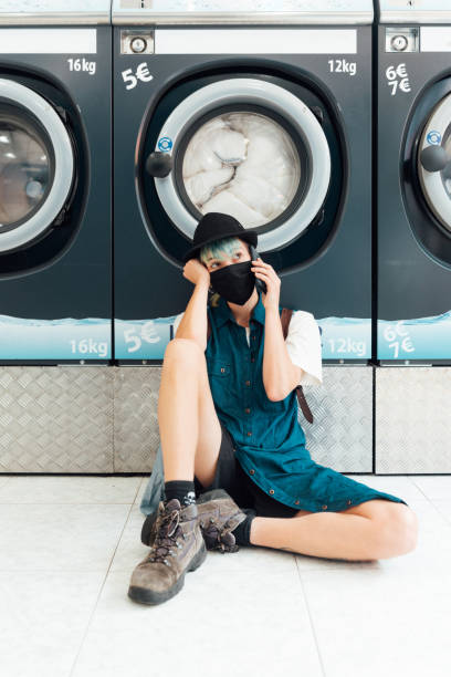 istock young girl in laundry 1289445097