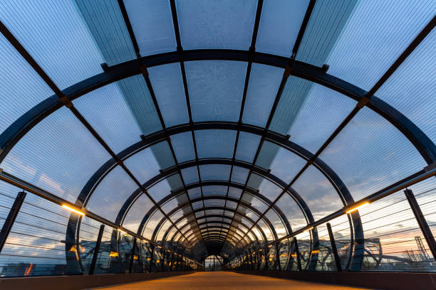 Subway station tunnel Subway station tunnel with modern architecture in Hamburg - Germany. architecture textured effect architectural feature business stock pictures, royalty-free photos & images