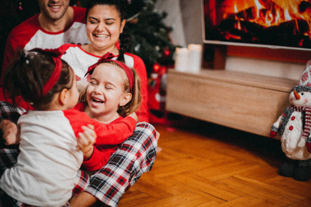istock Family and Christmas tree 1289456056