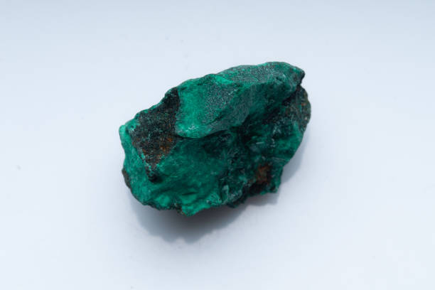istock Malachite green ore on a white background. Natural green malachite 1289456986
