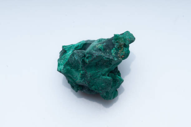 istock Malachite green ore on a white background. Natural green malachite 1289457001