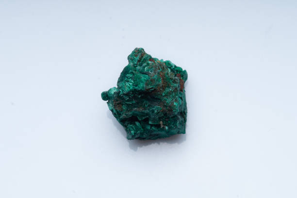 istock Malachite green ore on a white background. Natural green malachite 1289457017