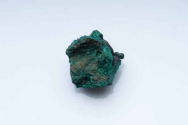 istock Malachite green ore on a white background. Natural green malachite 1289457021