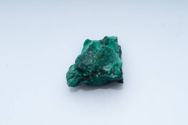 istock Malachite green ore on a white background. Natural green malachite 1289457091