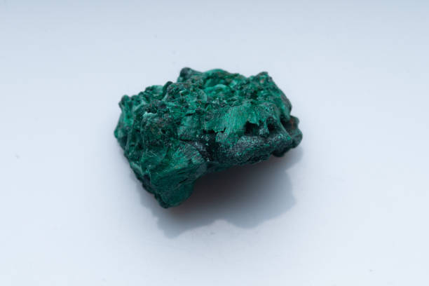 istock Malachite green ore on a white background. Natural green malachite 1289457111