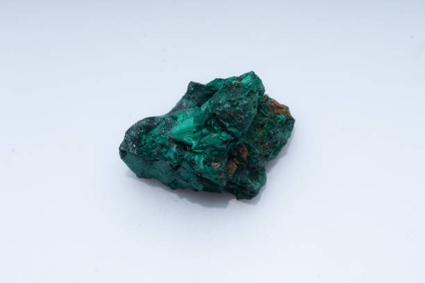 istock Malachite green ore on a white background. Natural green malachite 1289457120