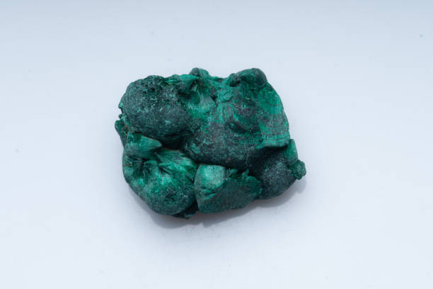 istock Malachite green ore on a white background. Natural green malachite 1289457176
