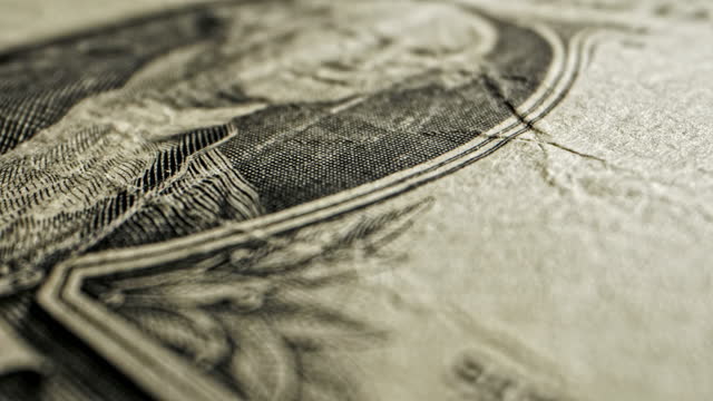 Close-Up Macro Dolly Shot of President George Washington on the Front of a 2009 US American One Dollar Bill