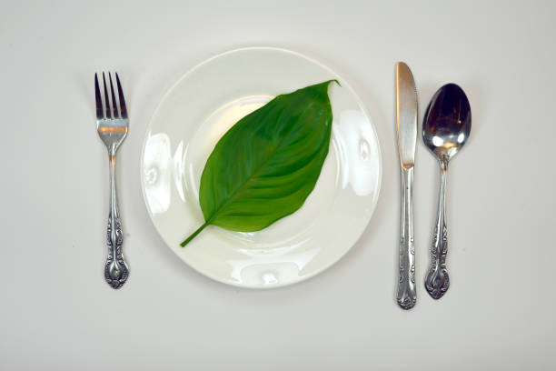 A collection of green foods with a green background