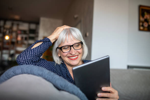 istock Mature Woman With Digital Tablet 1289467957
