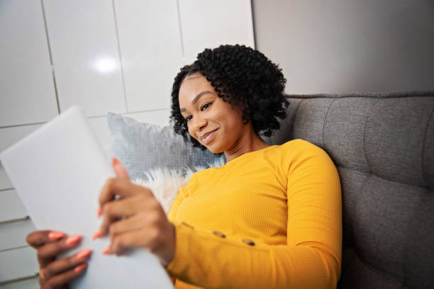 istock African American Woman With a Digital Tablet 1289467986