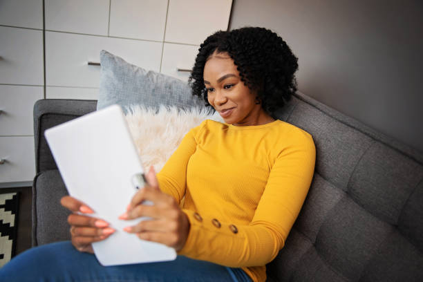 istock African American Woman With a Digital Tablet 1289467988