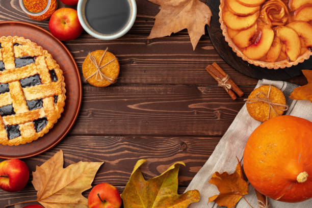 istock Thanksgiving berry and apple various pies on wooden surface, top view 1289469025