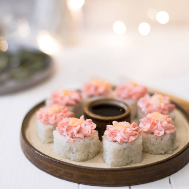 istock Sushi roll with pink cream, salmon 1289482585
