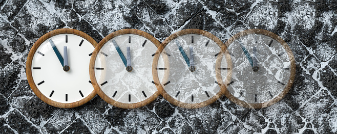 clocks fading away on snowy lava stone street background - 3d illustration