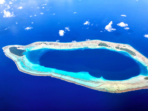 When flying from Honolulu to Guam by the classical flight United Airlines UA154 (a hip-hop filght over the Pacific Ocean, having 5 stopovers in the beautiful Pacific Islands), you must sit a window seat because the scenary outside the window is too astonishing to be missed. Numerous islands, beaches, atolls and lagoons are so amazing that you will have a unforgettable trip in you whole life. Here is the famous Pakin Atoll in Micronesia.