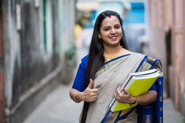 Young Indian Female School Teacher Or College Professor Stock Photo - Download Image Now - iStock Young Indian Female School Teacher Or College Professor Stock Photo - Download Image Now - iStock
