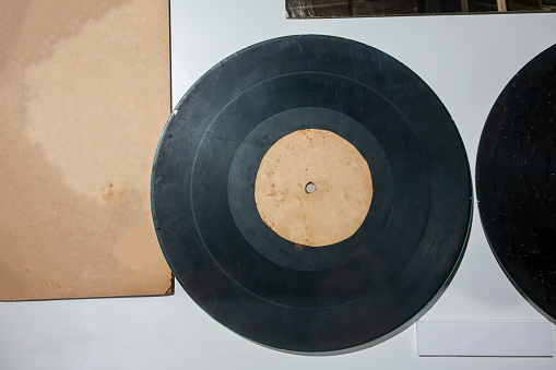 old vinyl records against white background. Vintage retro concept.