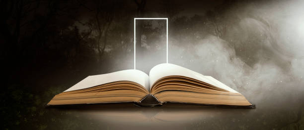istock An old book opened in the night forest 1289493465