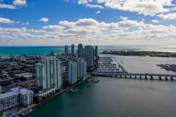istock Aerial photo Miami Beach in cloud cover shadow 1289494537
