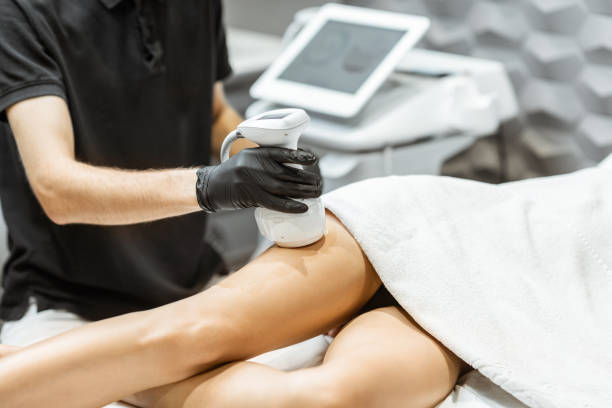 istock Ultrasound liposuction procedure for a male client 1289500151
