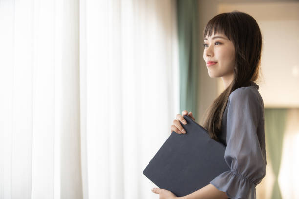 istock Woman with blue file 1289508725