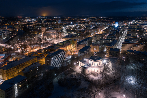 Aerial view of city skyline at winter night in Turku, Finland