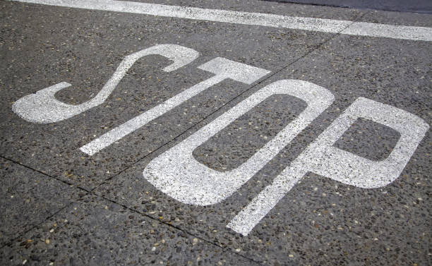 istock Stop sign on the asphalt 1289513871