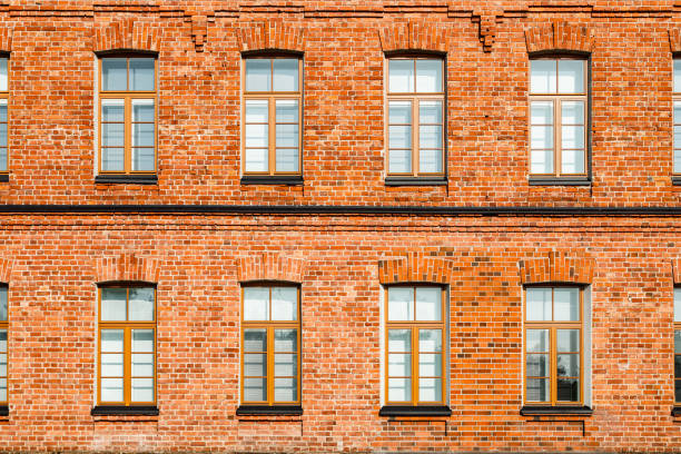 istock Beautiful vintage red brick building at sunny day 1289521400