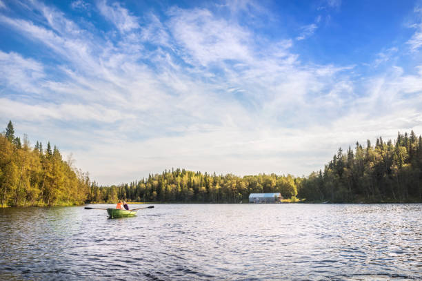 istock People ride a boat on a lake on the Solovetsky Islands 1289522624