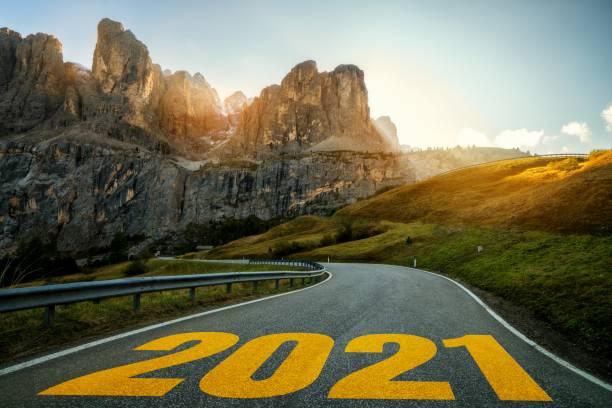 istock 2021 New Year road trip travel and future vision concept . 1289525556
