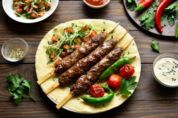 istock Turkish Adana Kebab with fresh vegetables 1289526123