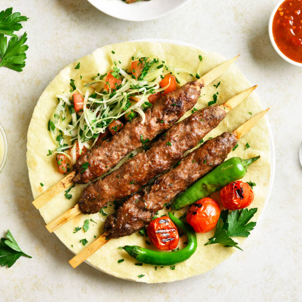 istock Turkish Adana Kebab with fresh vegetables 1289526125