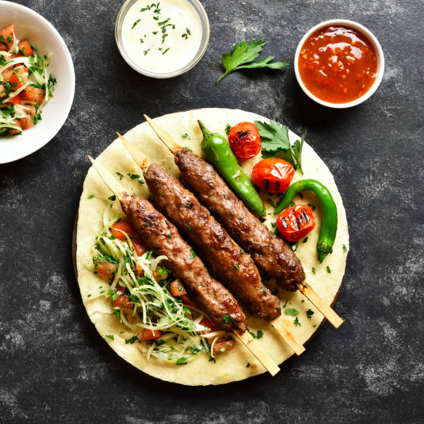 istock Turkish Adana Kebab with fresh vegetables 1289526129